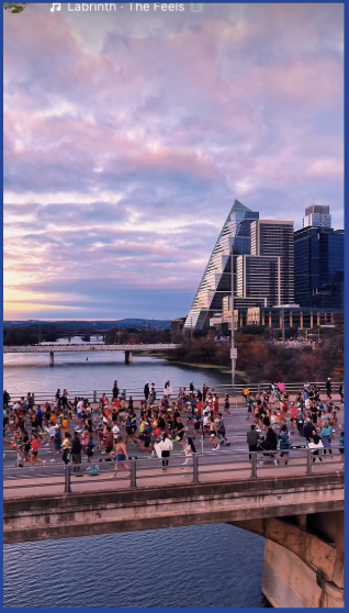 Aerial bridge shot with Austin skyline at golden hour