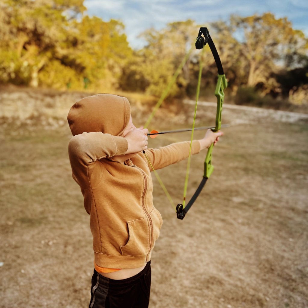 Private archery range with targets set against Texas Hill Country backdrop
