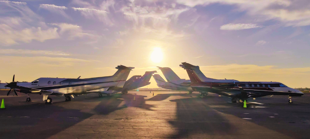 Private jets at sunrise