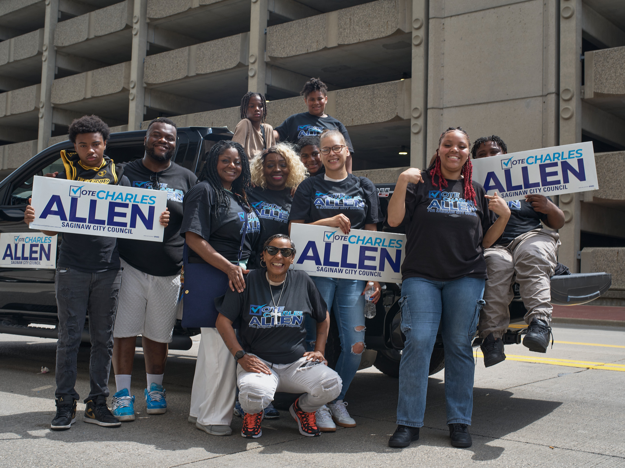Supporters wearing All In With Allen campaign t-shirts