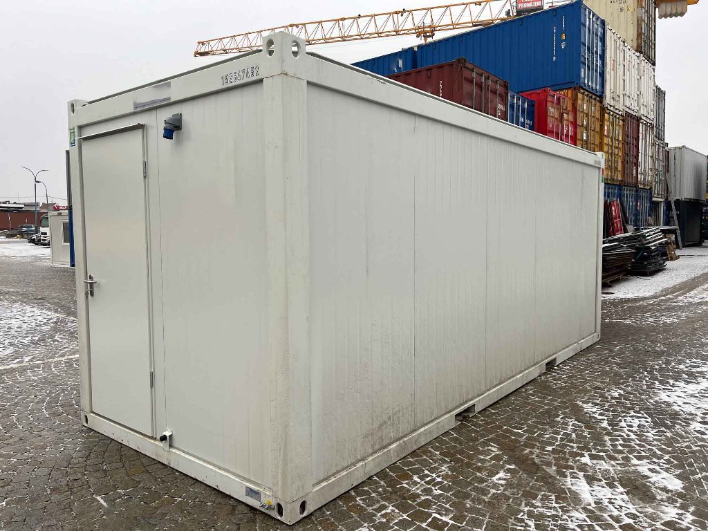 Gebrauchter weißer Bürocontainer im Freigelände