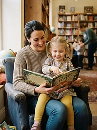 A parent reading with a child