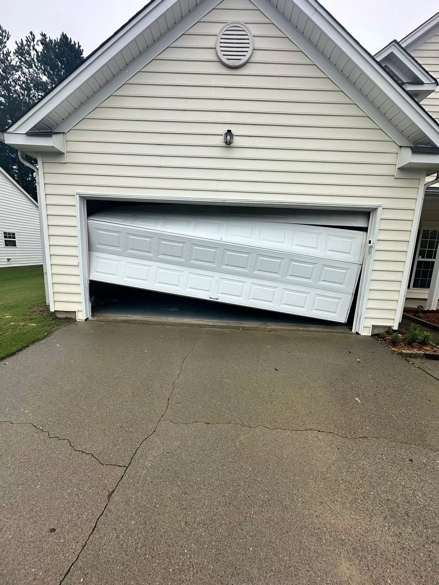 Off-Track Door Realignment - before