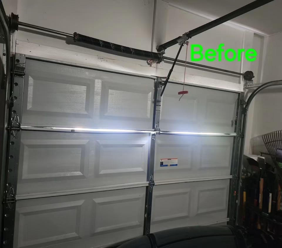Torsion Spring & Panel Repair - before