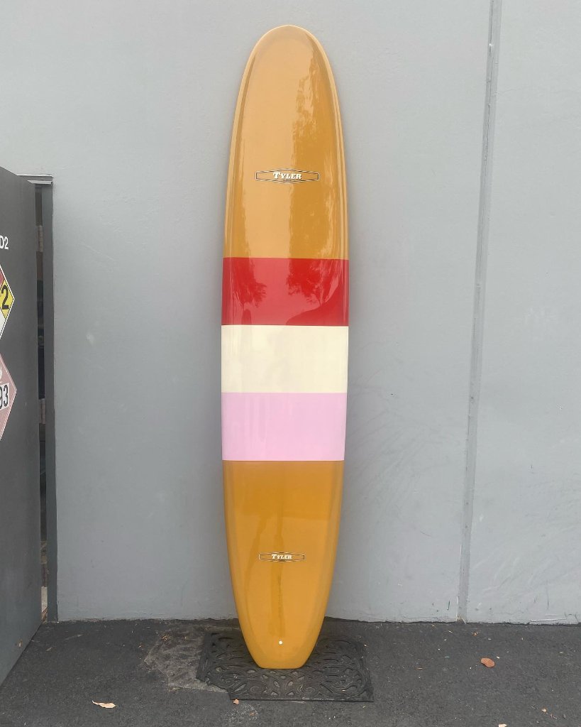 Log caramel bandes rouge-blanc-rose
