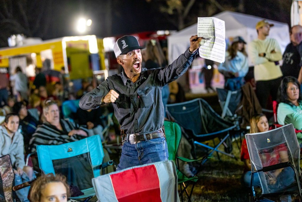 Auctioneer in crowd