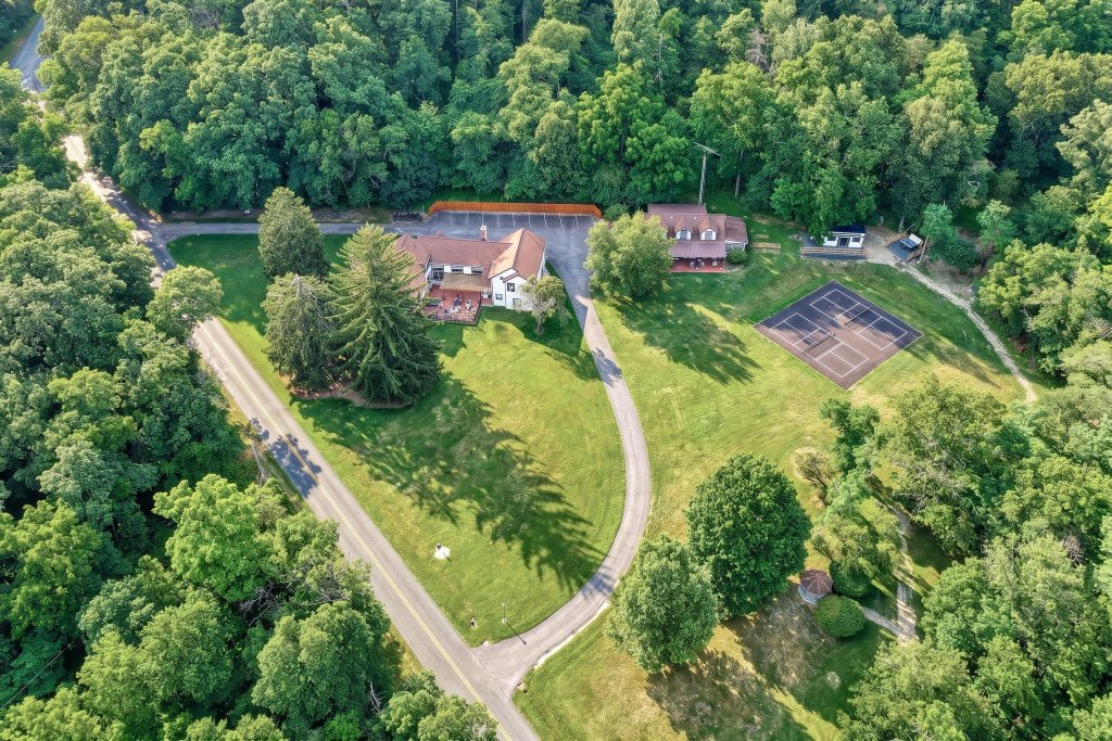 Aerial drone view of the Baladerry Inn grounds surrounded by forest