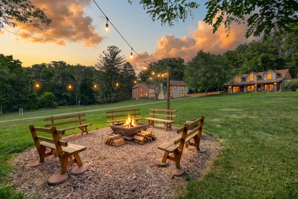 Fire pit gathering at twilight