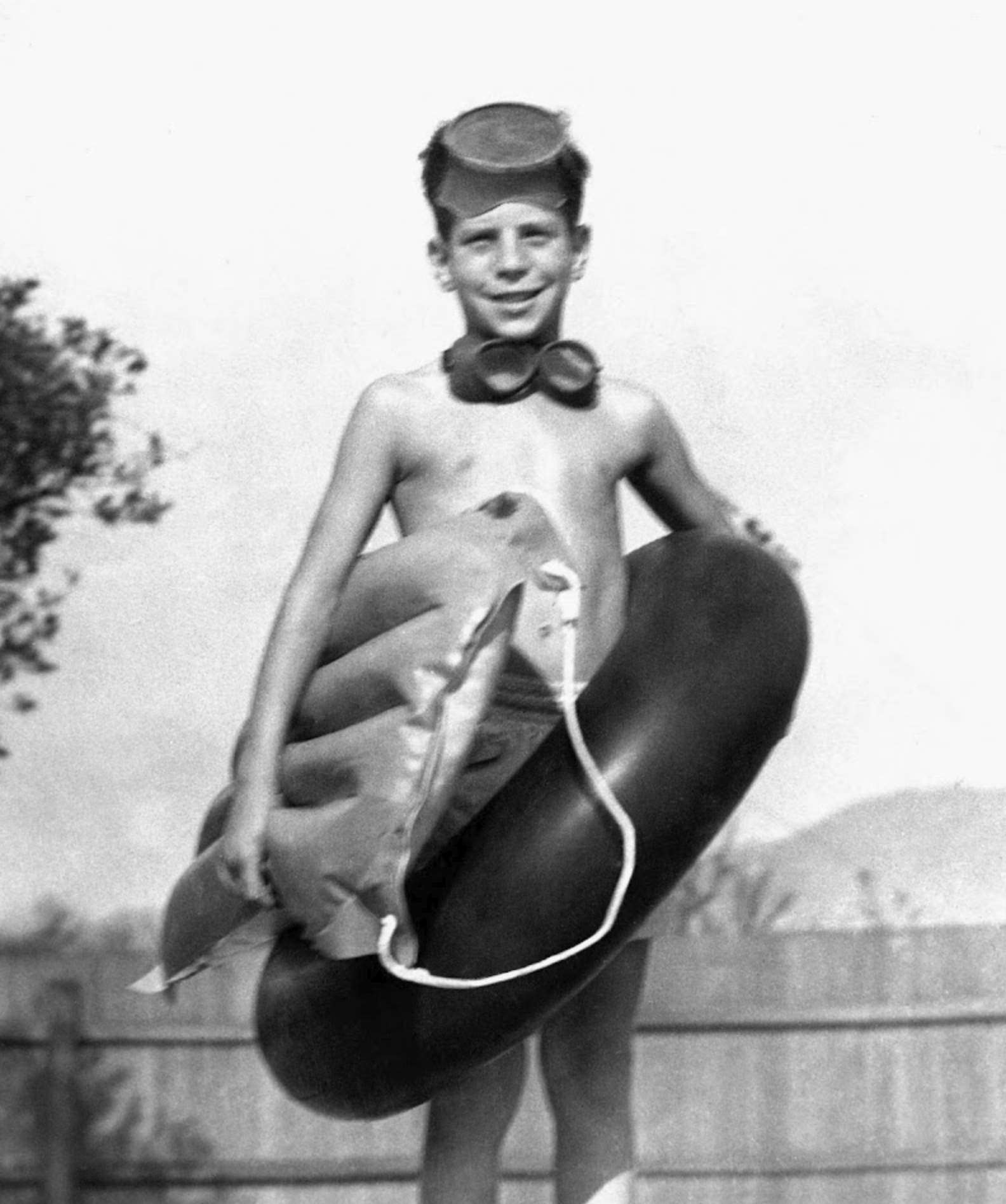 Young Doug Steimle, son of founder Wayne Steimle, with a pool float