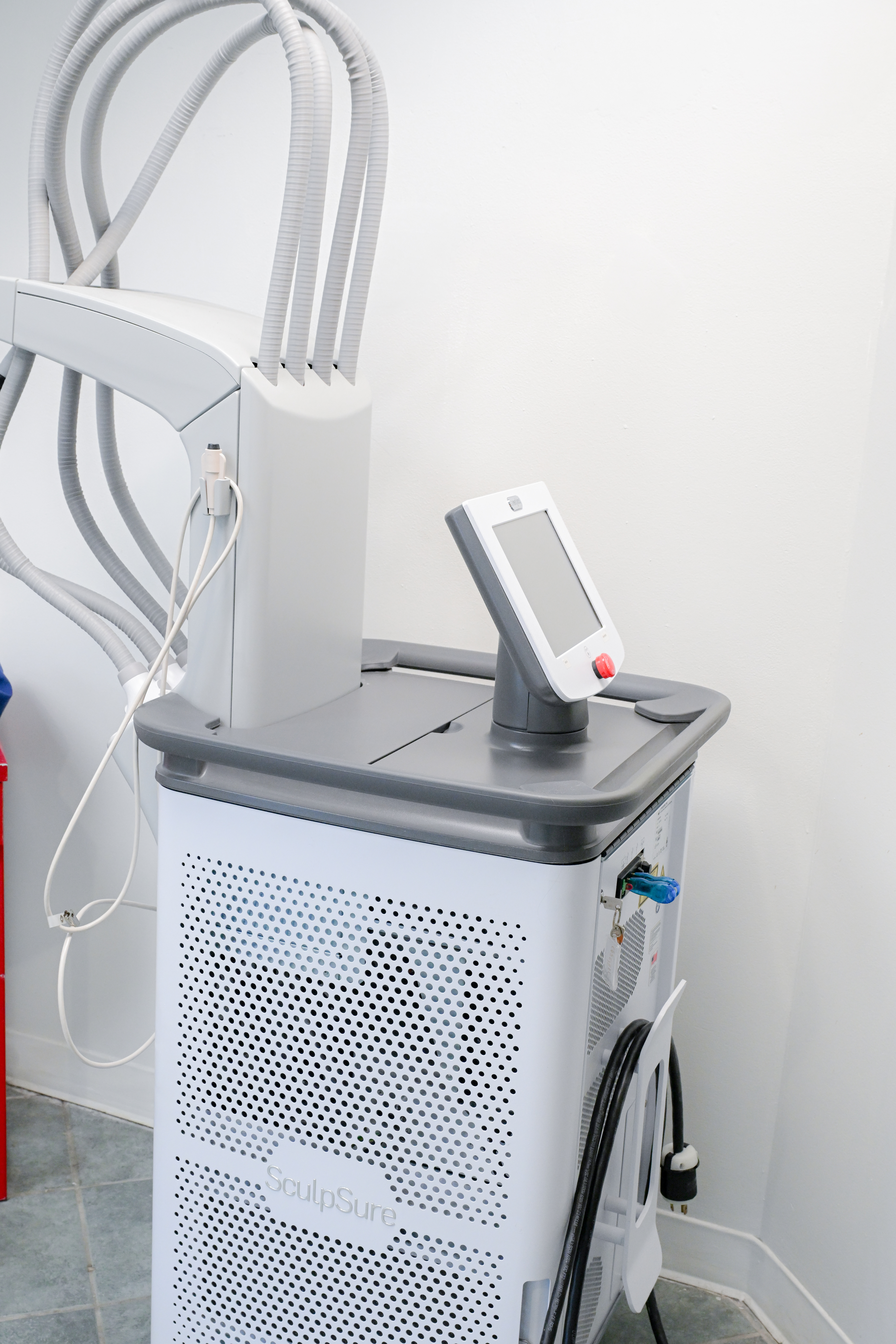 Laser platform with cooling cable array and touch-screen console in the Highstyle Laser Center treatment room in Boston