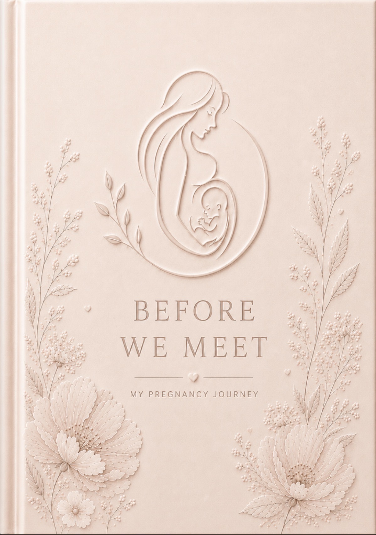 Blush keepsake book cover titled Before We Meet, My Pregnancy Journey, with embossed floral detailing