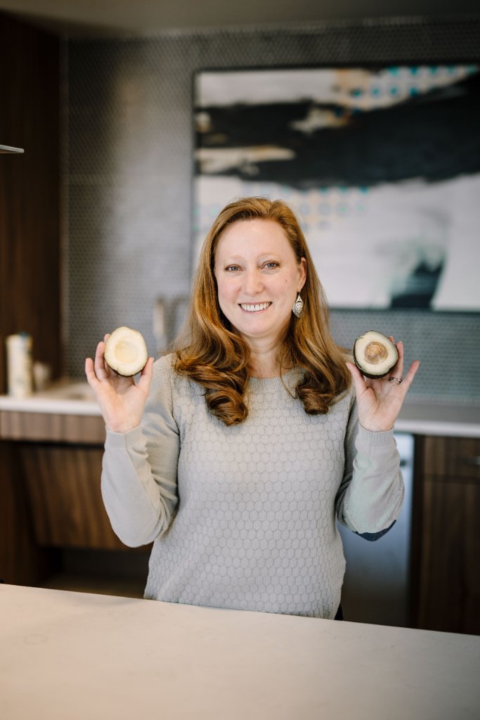 Erika holding avocado halves