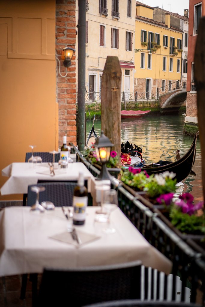 Evening terrace dining with glowing lanterns