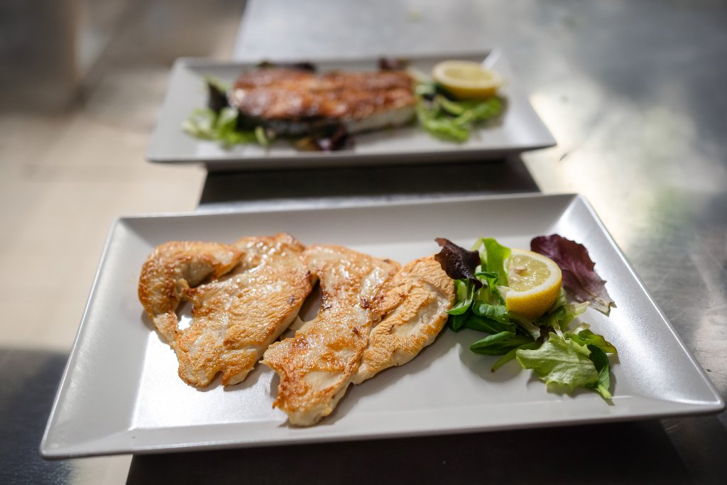 Seared fillets with lemon and salad