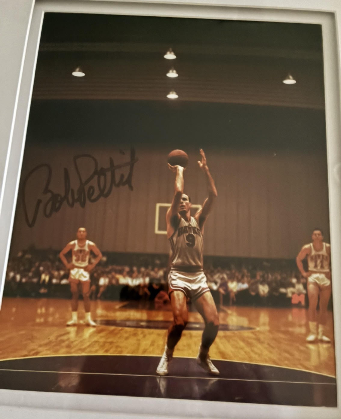 Bob Pettit shooting his classic one-handed free throw in Kiel Auditorium. Circa 1958