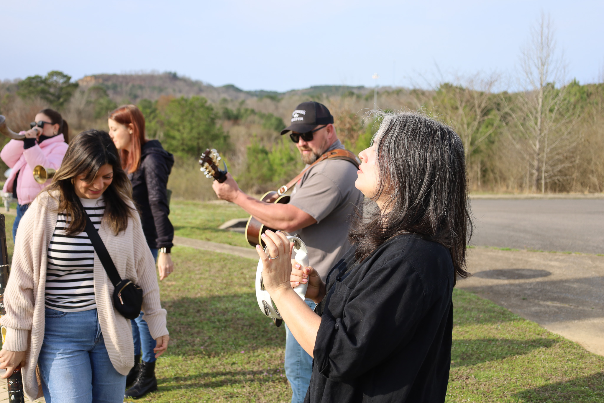 Tambourine and guitar outdoors