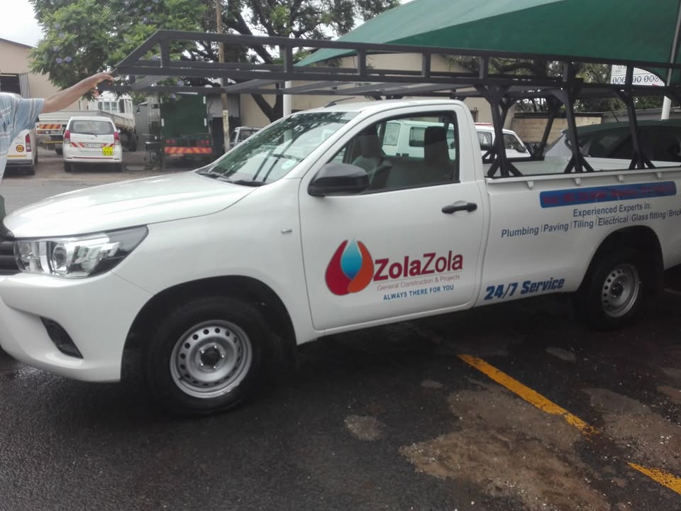 Zola Zola branded service vehicle — 24/7 plumbing & construction