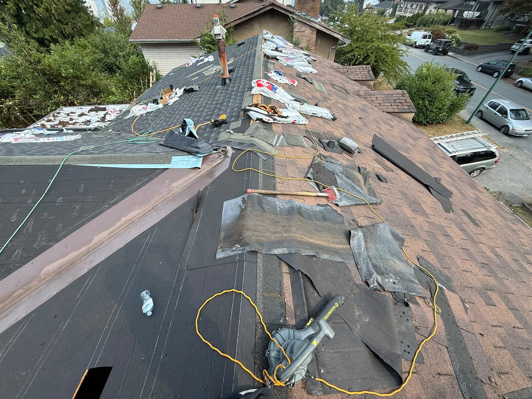 Gabled roof with asphalt shingles installed by Red Maple Roofing