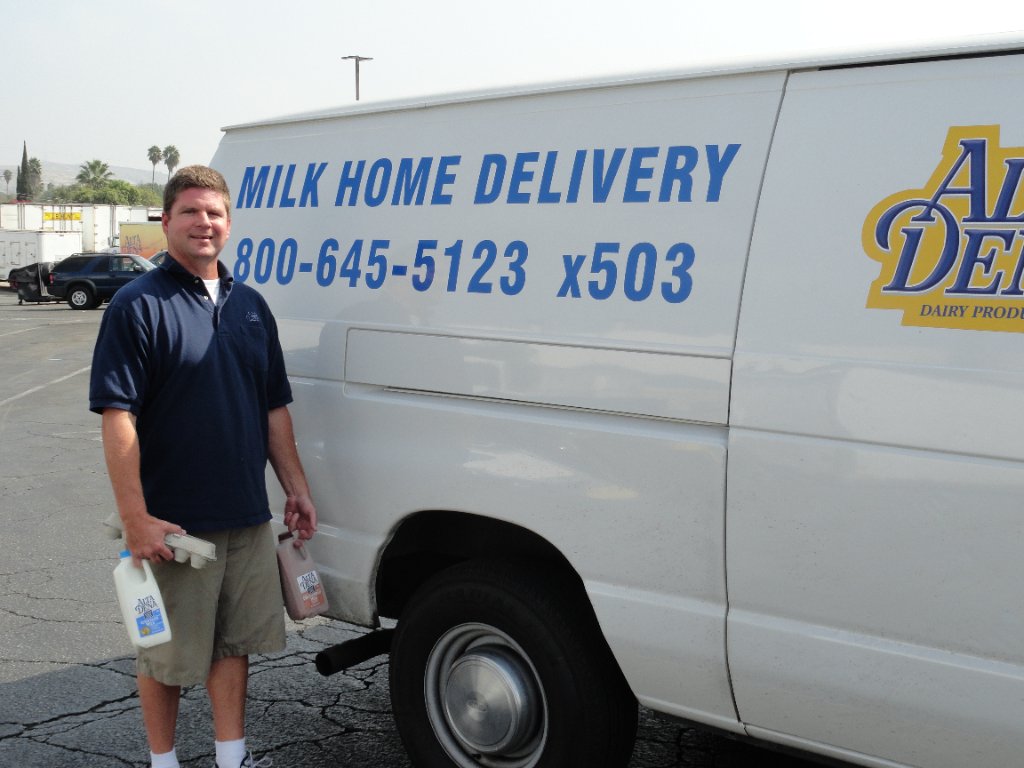 Wes Miller beside his Alta Dena delivery van in Santa Monica