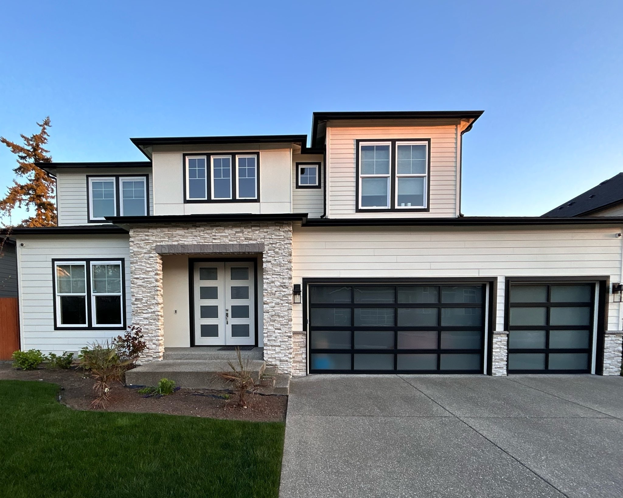 Cream Siding with Black Frames