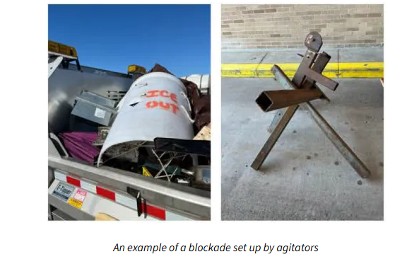 ICE OUT barrel shield in U-Haul and Czech hedgehog obstacle