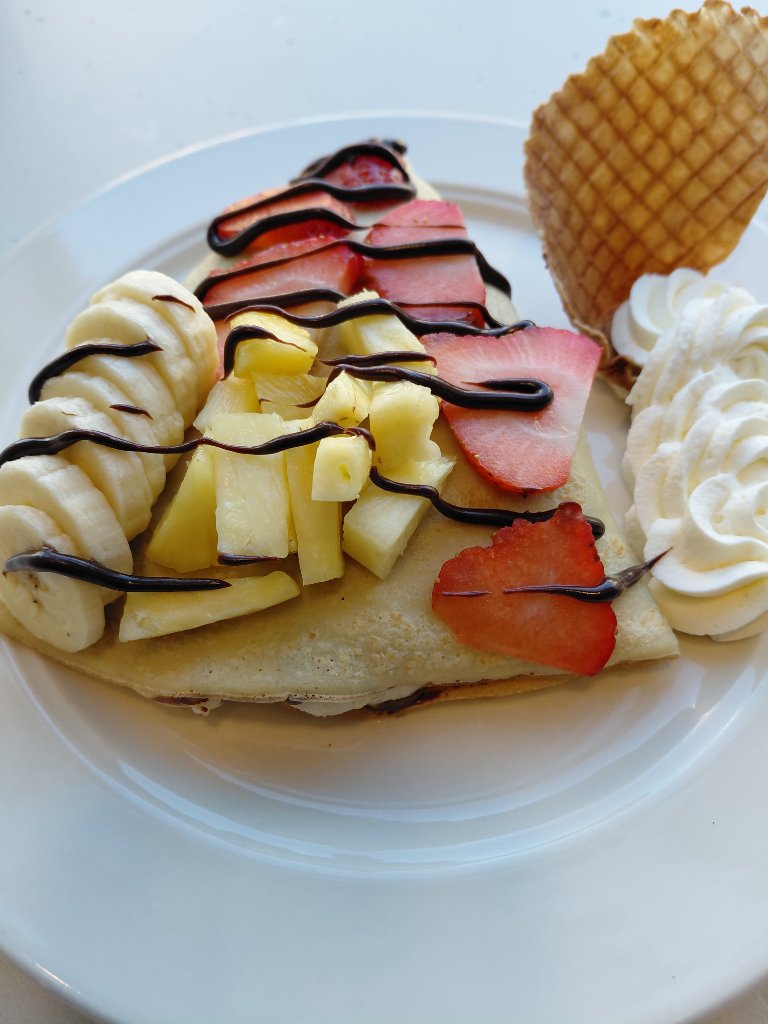 Fresh Nutella crepe with fruit at Crepes & Treats, the best sweet crepes in St. Louis Central West End