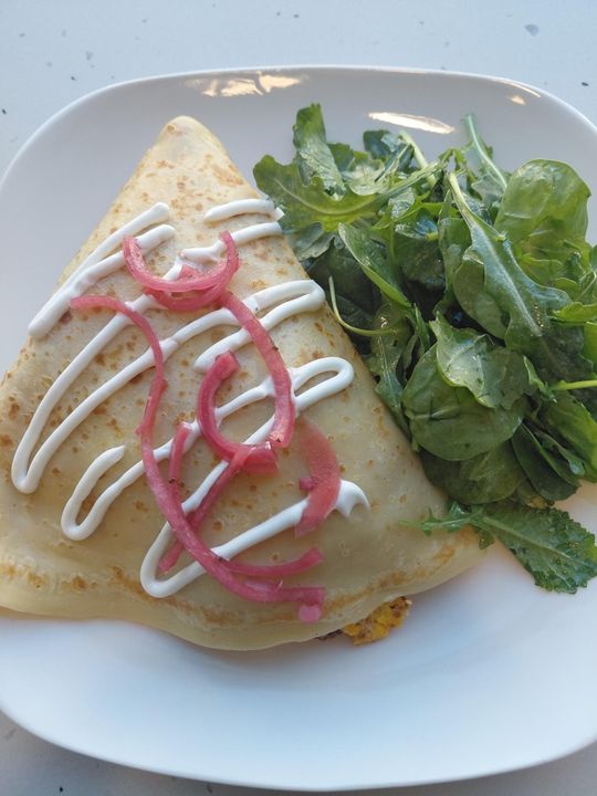 Mexican Sausage savory crepe with sour cream and red onion escabeche at Crepes & Treats St. Louis