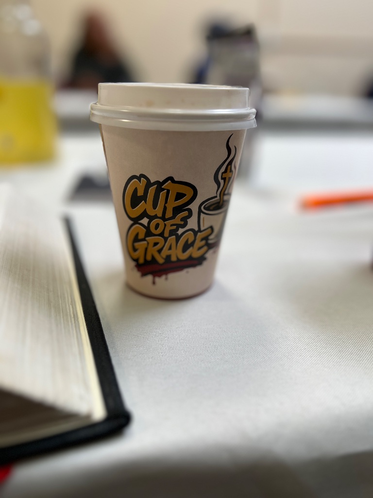 A cup of Cup of Grace coffee
