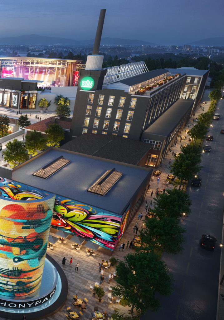Old Woolen Mill aerial render at night with Whole Foods and street art