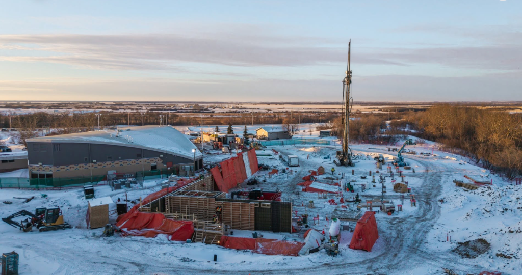 Construction site with concrete pour at industrial facility