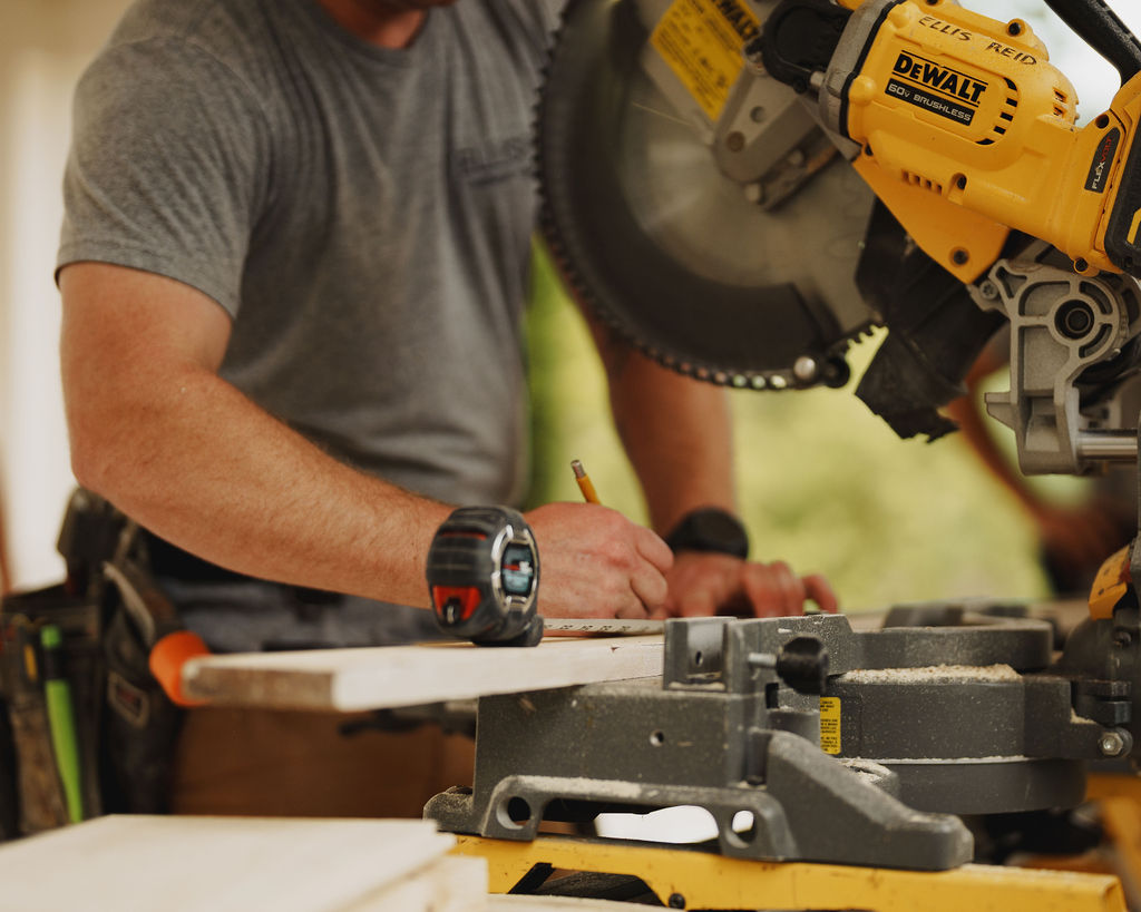 Ellis-Reid Millwork + Specialties shirt on a crew member