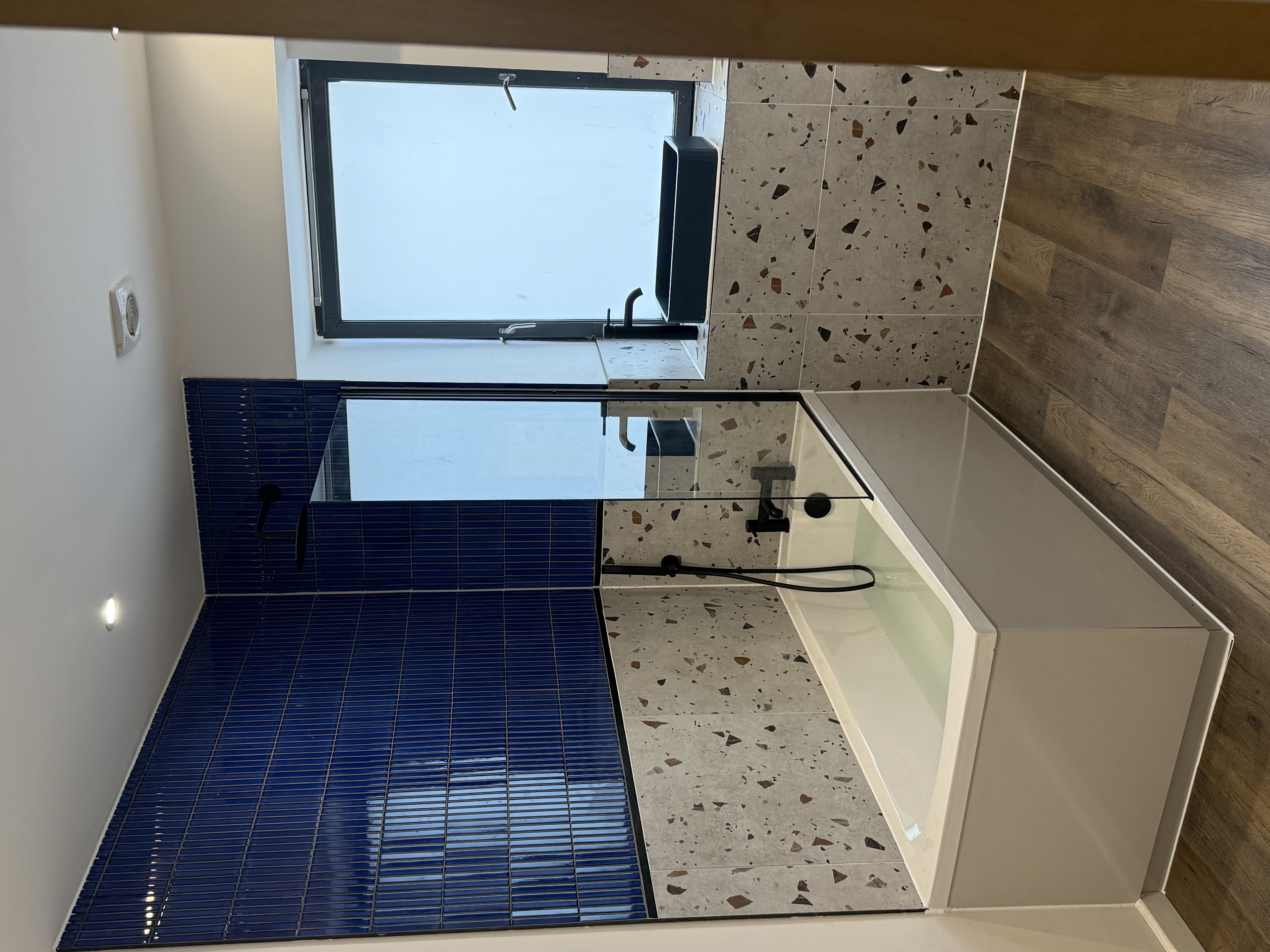 Bath & Shower completed bathroom renovation by Calico Joinery in Edinburgh