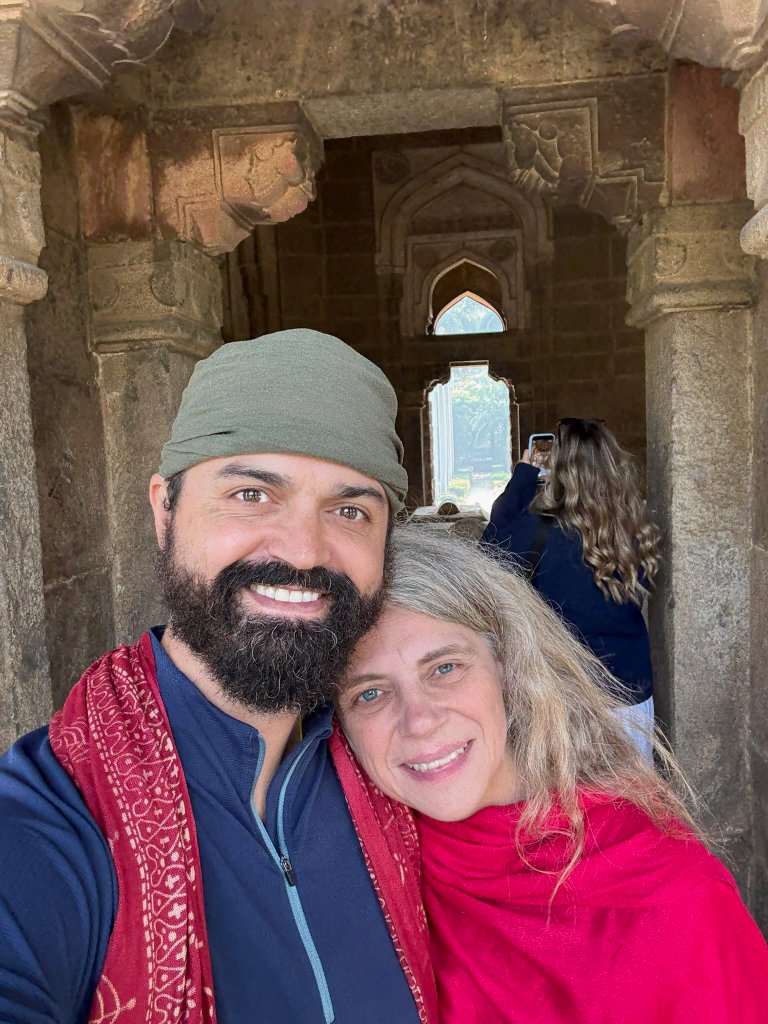 BJ and Val exploring historic architecture — a couple living a sustainable, mindful, Vedic-inspired way of life at Forest Sanctuary.