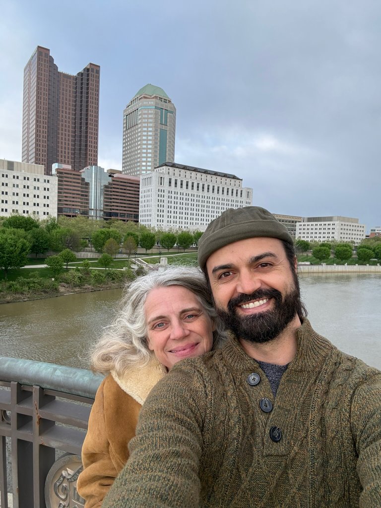 BJ and Val in the city — carrying the values of intentional community, permaculture, and conscious living wherever they go.