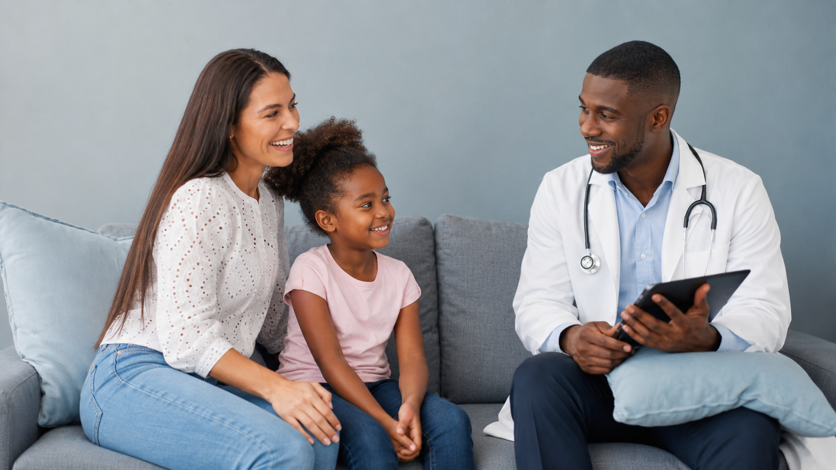 A family speaking with their private doctor