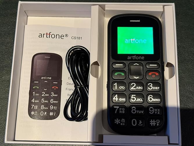 Artfone C1+ 4G powered on in open box showing artfone startup screen