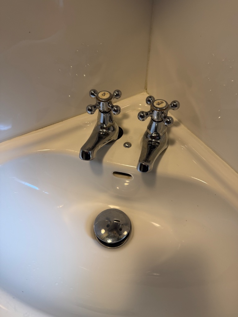 Hard to Use Basin Taps Replaced — before