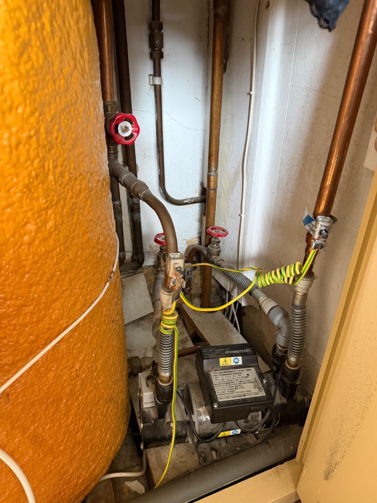 Shower Pump Repair — before
