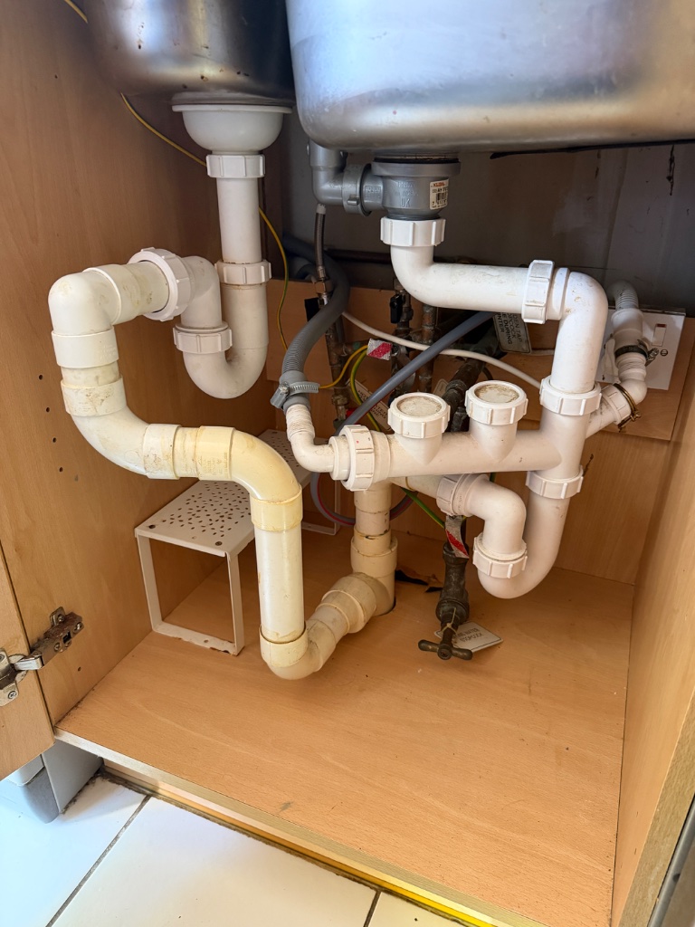 Kitchen Waste Pipe Reorganization — before