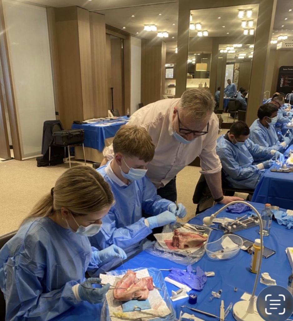 Dr John McHugh with Astrid and Jonathan McHugh at bone grafting workshop — Geistlich and Dr Troeltzsch