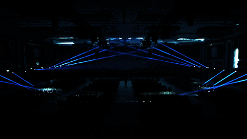 Aerial view of a global communications network at night with glowing data nodes