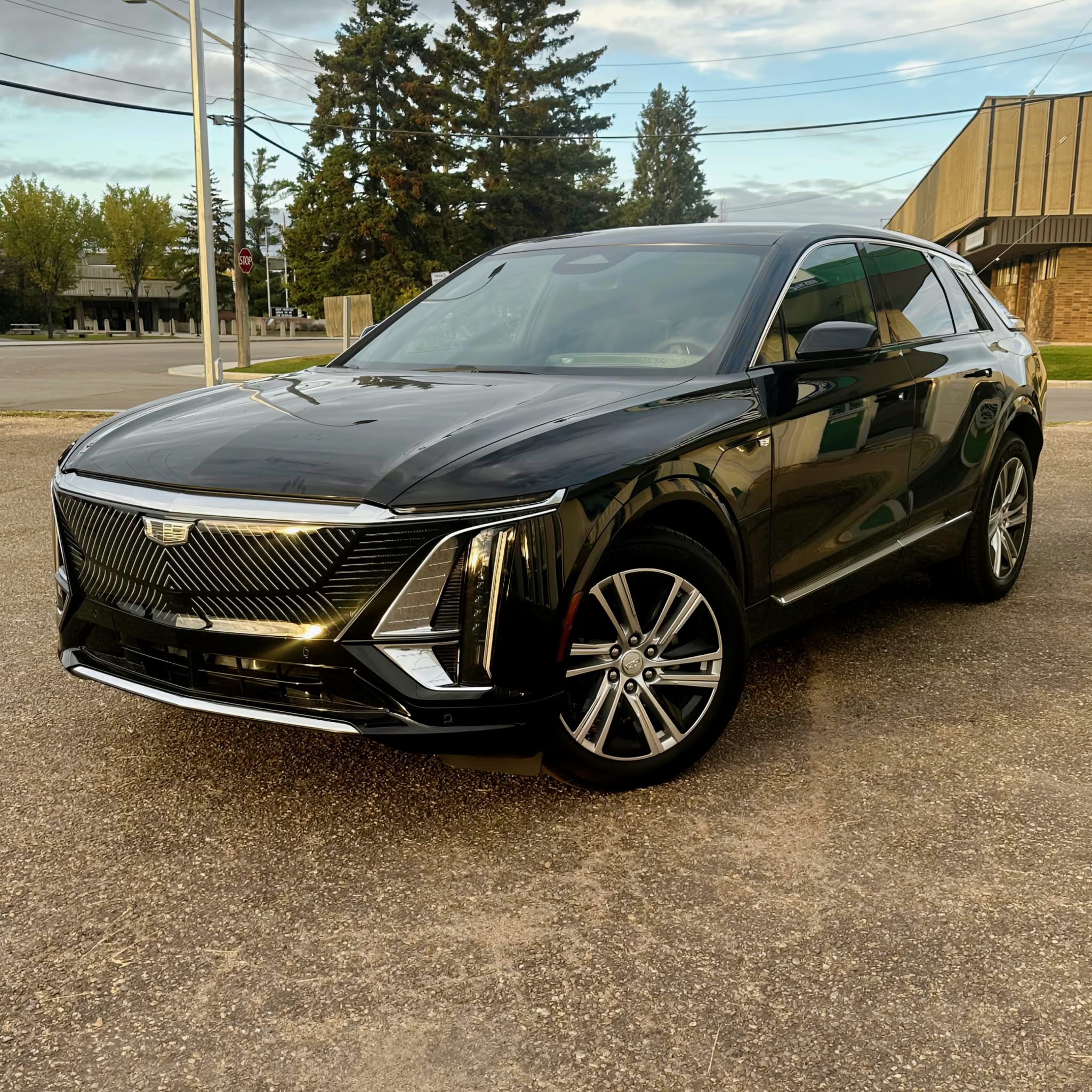 Black Cadillac SUV arriving at the studio before its paint protection film installation in Edmonton