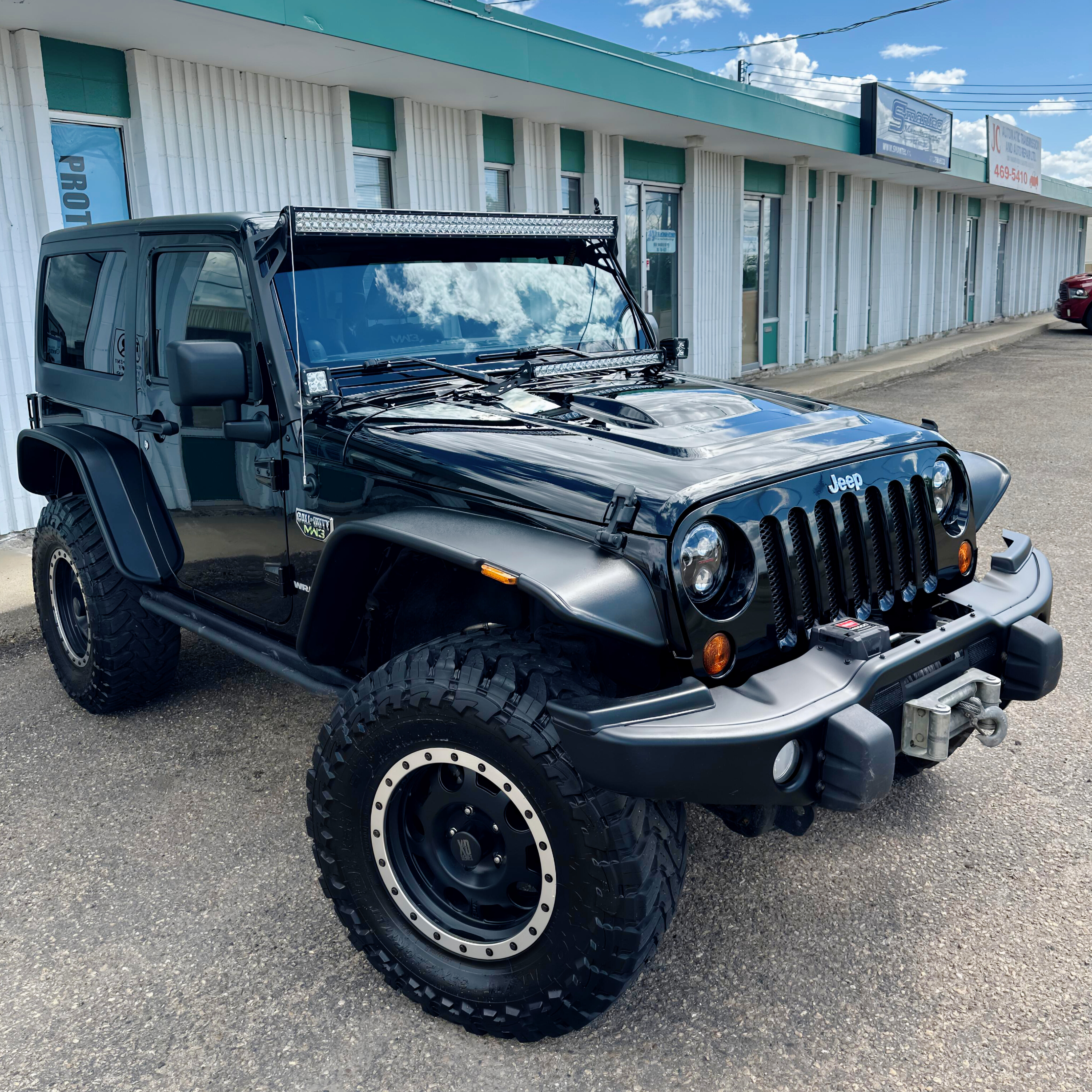 Black Jeep Wrangler after paint correction in Edmonton