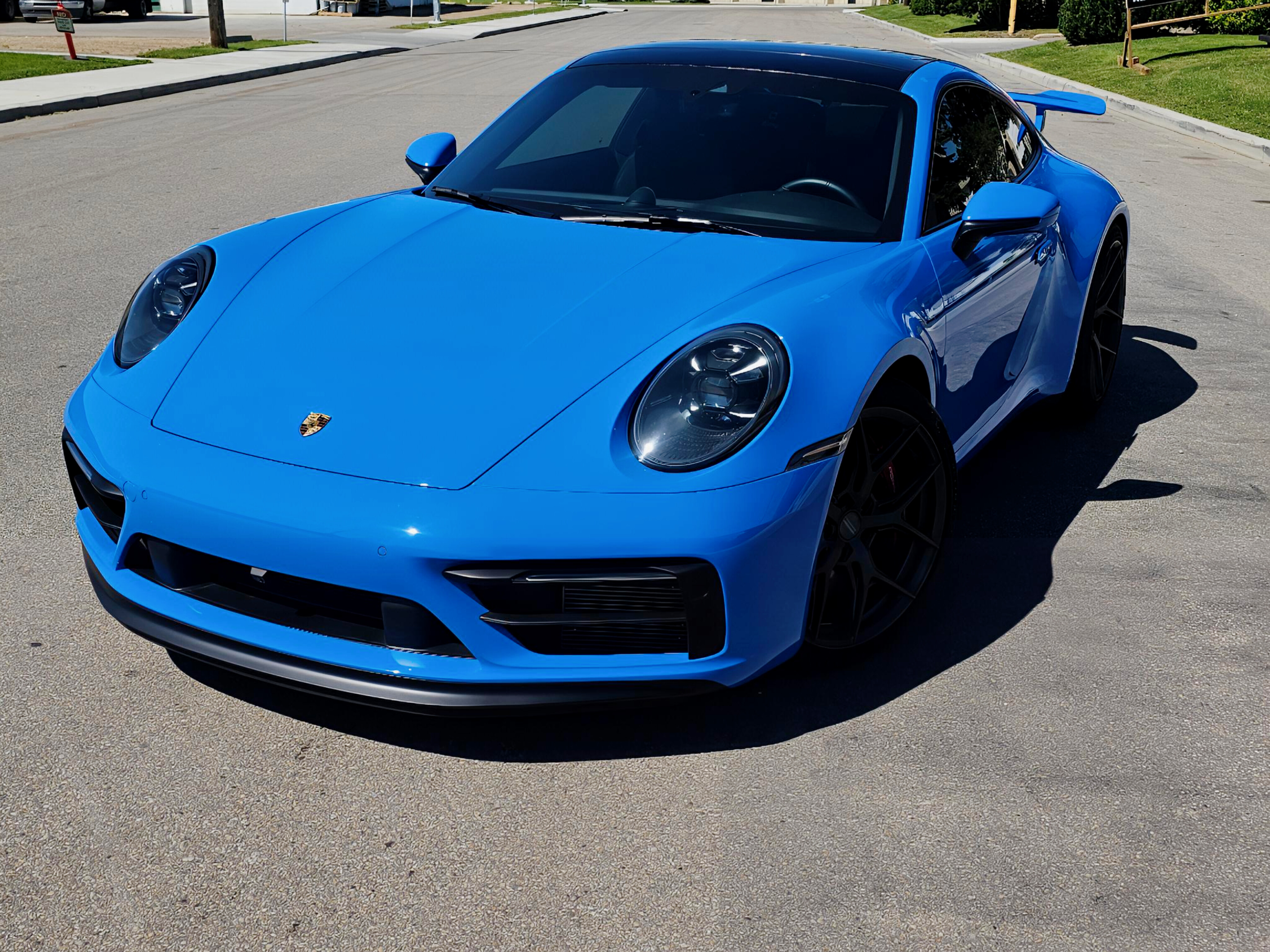 Shark Blue Porsche 911 with full front paint protection film in Edmonton