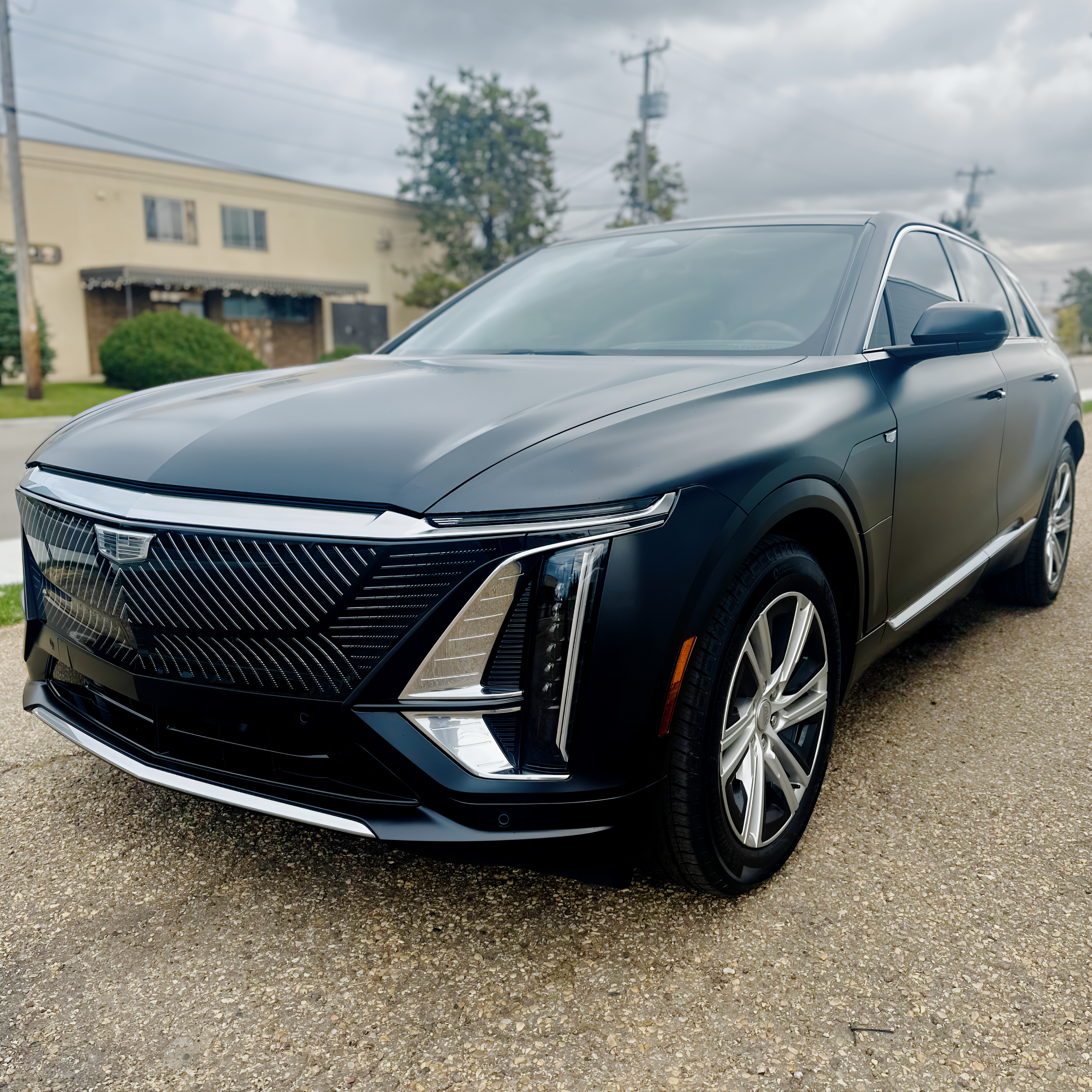 Matte black Cadillac SUV with stealth paint protection film installed in Edmonton