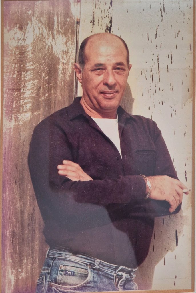 Carmel Shabi — portrait on mobile, silver Judaica exhibition on desktop