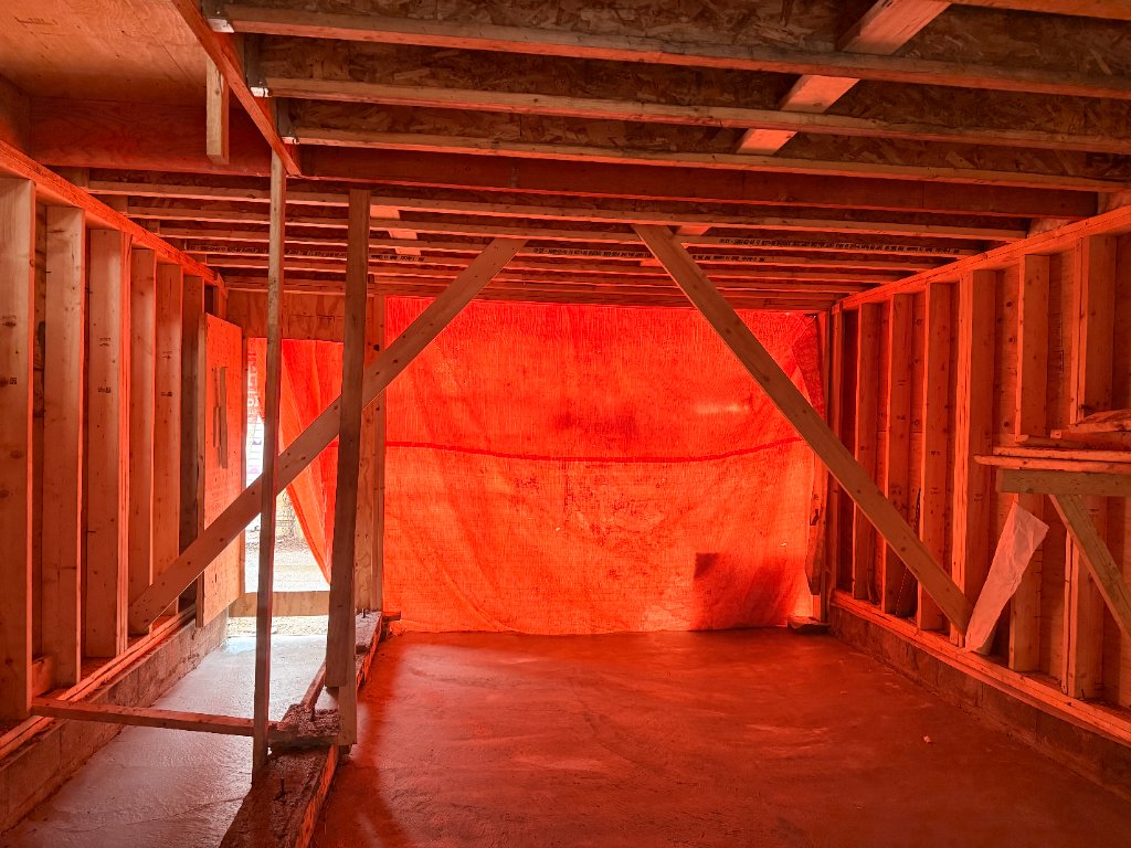 Interior framing view during garage door installation in Dovercourt & Queen, Toronto