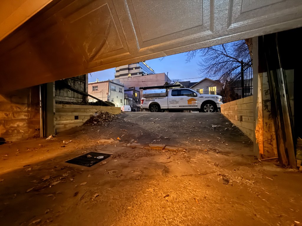 Garage Door Maintenance & Inspection — GTA Garage Door service truck at a Toronto home