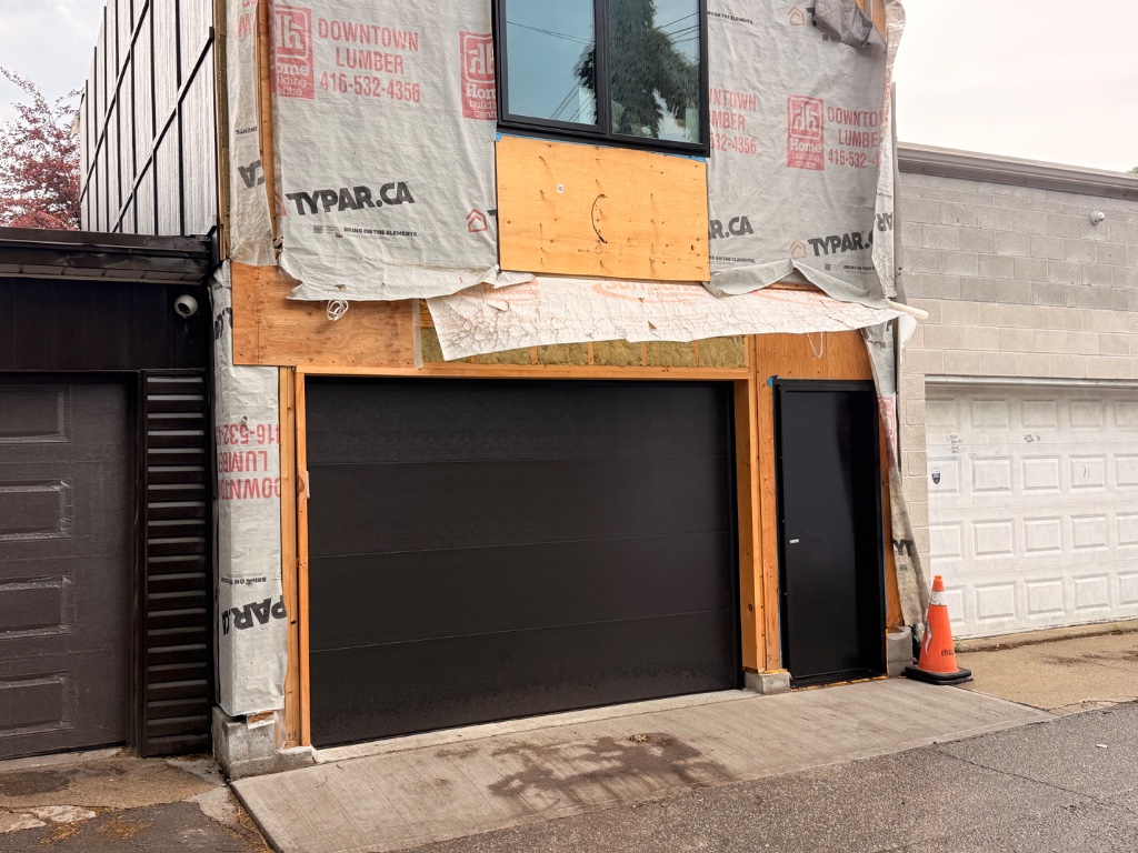 Black Flush-Panel Door — Dovercourt & Queen — Toronto, ON