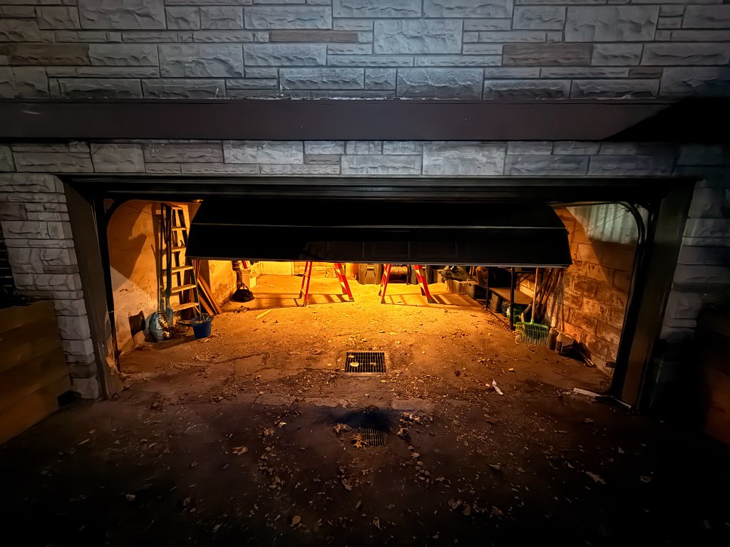 Before — door knocked off track